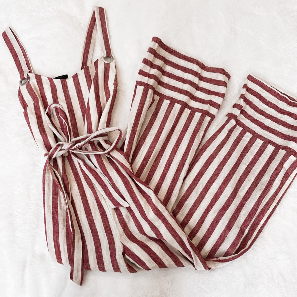 Pinstripe jumpsuit with ties around waist